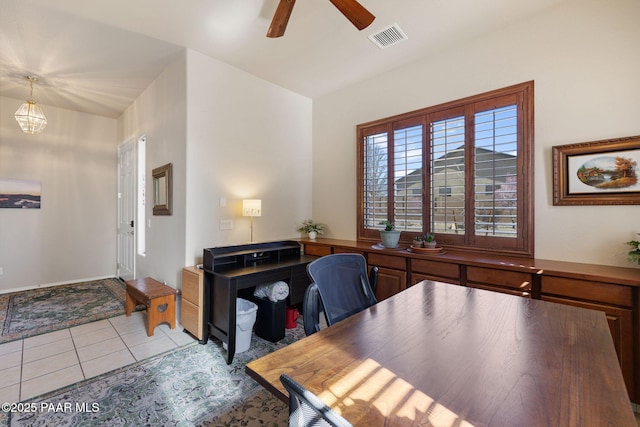 office with light tile patterned floors, visible vents, and a ceiling fan