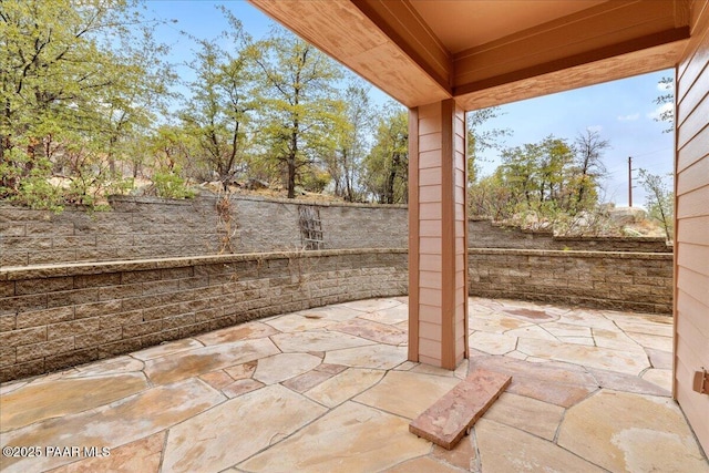 view of patio with fence