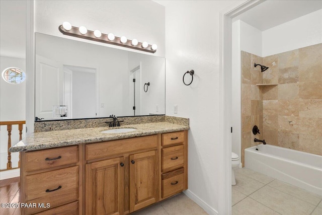 full bath featuring vanity, toilet, tile patterned flooring, and shower / bath combination