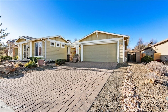 ranch-style house featuring a garage