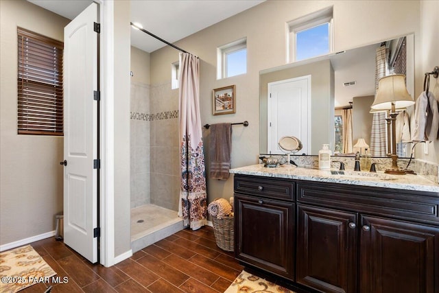 bathroom featuring vanity and a shower with curtain