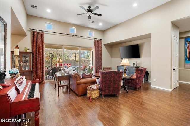 living room featuring ceiling fan