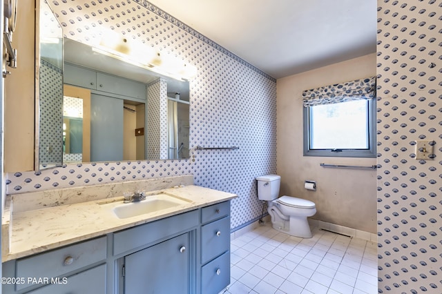 769 Cherokee Rd, Prescott, AZ 86303 - bathroom with wallpapered walls, vanity, a shower, and tile patterned flooring