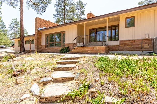 769 Cherokee Rd, Prescott, AZ 86303 - view of front of property featuring a chimney and stone siding