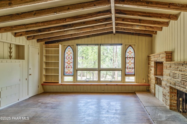 769 Cherokee Rd, Prescott, AZ 86303 - unfurnished living room with hardwood / wood-style floors and wooden walls