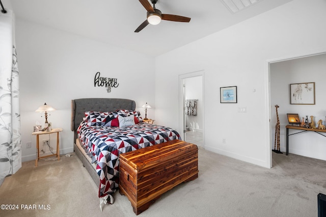 bedroom featuring carpet flooring, connected bathroom, and ceiling fan