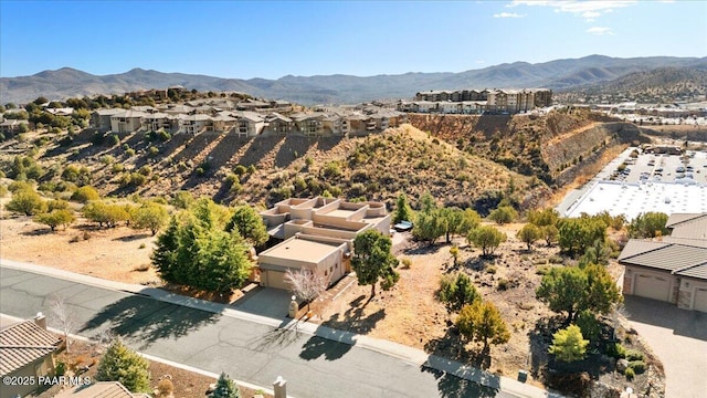 drone / aerial view featuring a mountain view