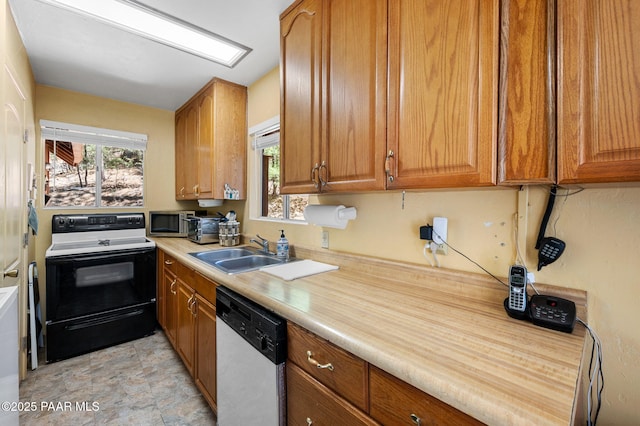 5980 S Old Walker Rd, Prescott, AZ 86303 - kitchen with range with electric cooktop, dishwasher, brown cabinets, and light countertops