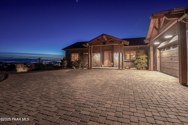 view of front of property with a garage