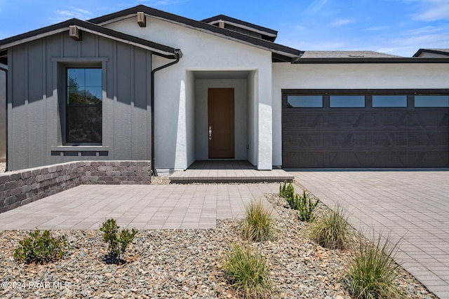 view of front of property with a garage