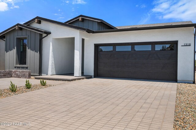 view of front of home with a garage