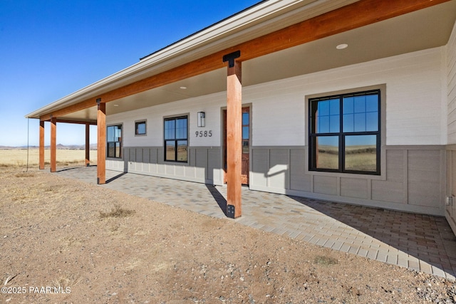 back of house with a patio area