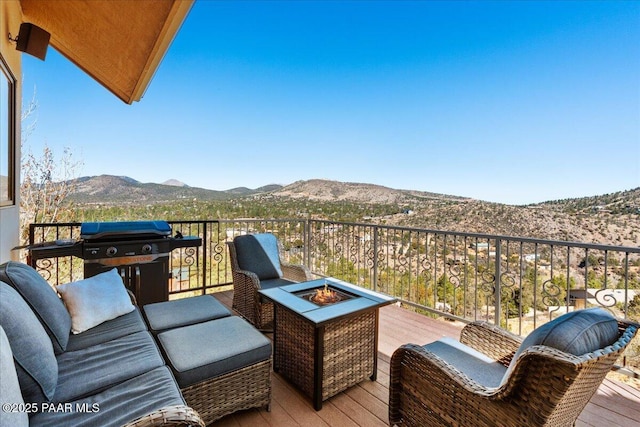 1310 W Carlock Dr, Prescott, AZ 86305 - wooden terrace featuring a mountain view and an outdoor fire pit