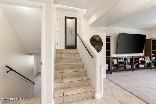 1310 W Carlock Dr, Prescott, AZ 86305 - staircase with carpet floors, tile patterned flooring, and baseboards
