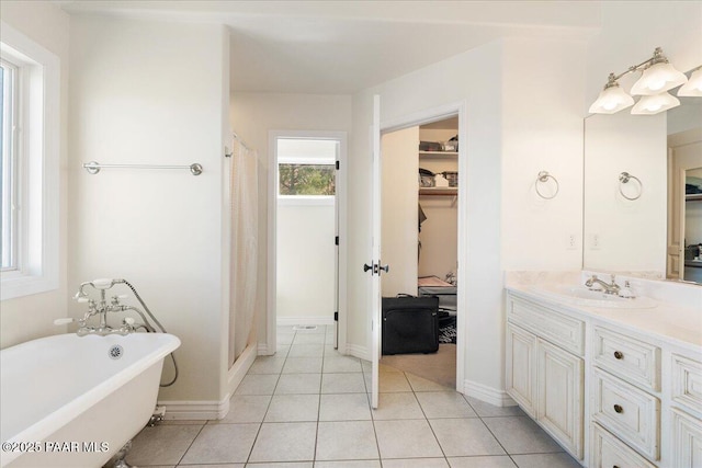 1310 W Carlock Dr, Prescott, AZ 86305 - bathroom featuring vanity, a freestanding bath, tile patterned floors, and curtained shower