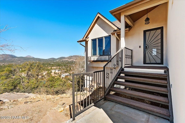 1310 W Carlock Dr, Prescott, AZ 86305 - view of exterior entry featuring a mountain view and stucco siding