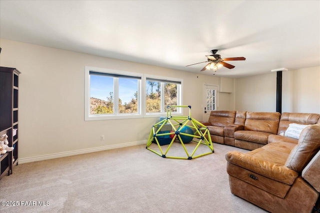 1310 W Carlock Dr, Prescott, AZ 86305 - living room featuring carpet flooring, ceiling fan, and baseboards