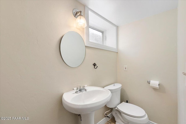 1310 W Carlock Dr, Prescott, AZ 86305 - half bath featuring toilet, a sink, and baseboards