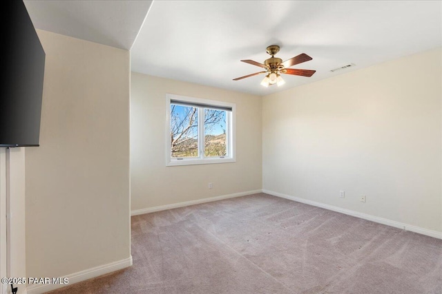 1310 W Carlock Dr, Prescott, AZ 86305 - carpeted spare room featuring ceiling fan and baseboards
