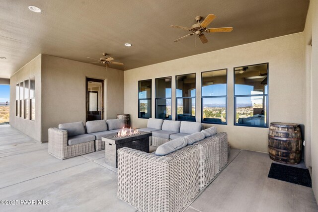 12300 W Slate Rd, Prescott, AZ 86305 - view of patio featuring an outdoor living space with a fire pit and a ceiling fan