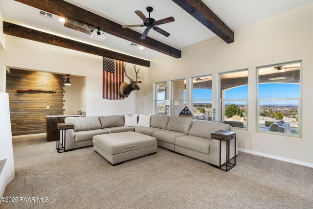 12300 W Slate Rd, Prescott, AZ 86305 - living room with carpet, visible vents, and a healthy amount of sunlight
