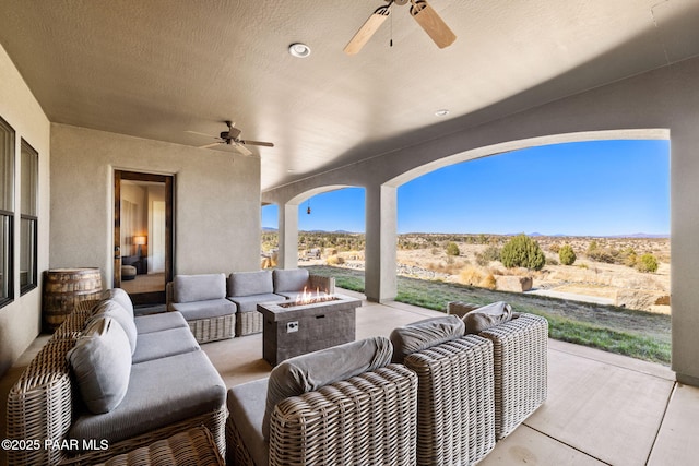 12300 W Slate Rd, Prescott, AZ 86305 - view of patio featuring an outdoor living space with a fire pit and ceiling fan