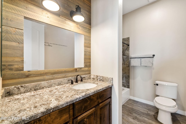 12300 W Slate Rd, Prescott, AZ 86305 - bathroom featuring vanity, toilet, wood finished floors, and baseboards