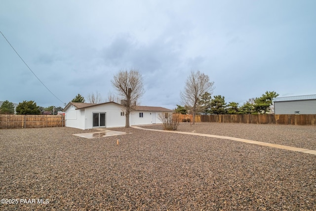 view of yard featuring a patio and a fenced backyard