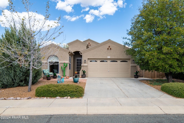 view of front of home with a garage