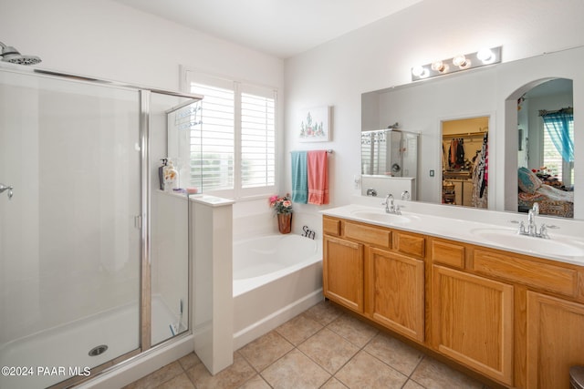 bathroom with plenty of natural light, independent shower and bath, and tile patterned flooring