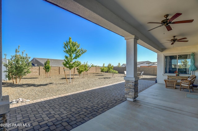 5306 Rocky Vista Dr, Prescott, AZ 86301 - fenced backyard featuring ceiling fan and a patio