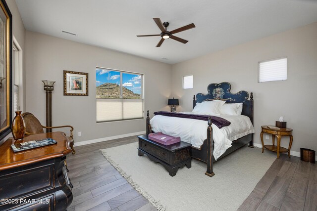 3771 Blazing Ore Trl, Prescott, AZ 86301 - bedroom with dark wood-style floors and a ceiling fan
