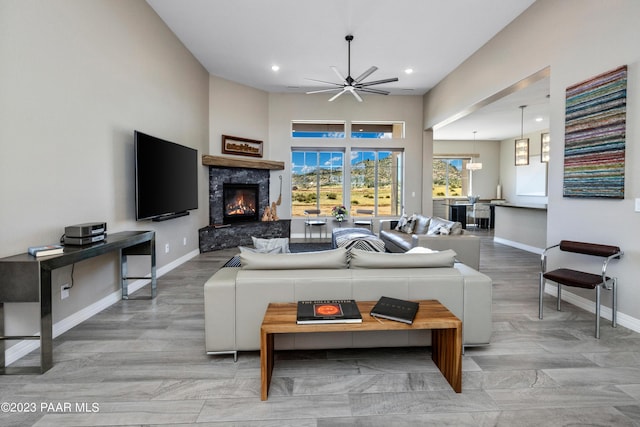 3771 Blazing Ore Trl, Prescott, AZ 86301 - living area with a ceiling fan, a fireplace, and recessed lighting
