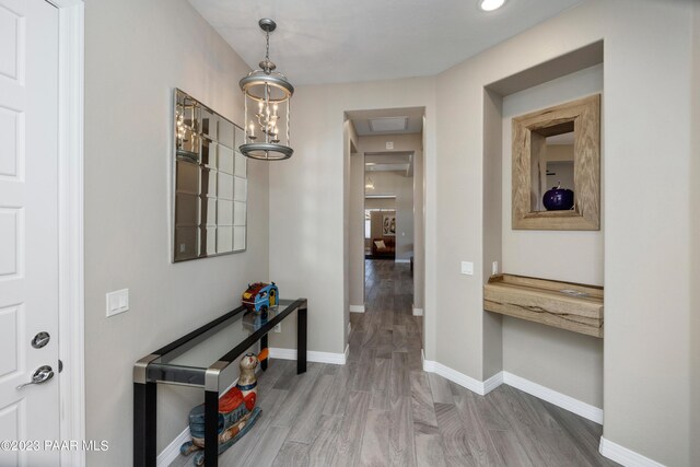 3771 Blazing Ore Trl, Prescott, AZ 86301 - corridor with hardwood / wood-style floors and a chandelier
