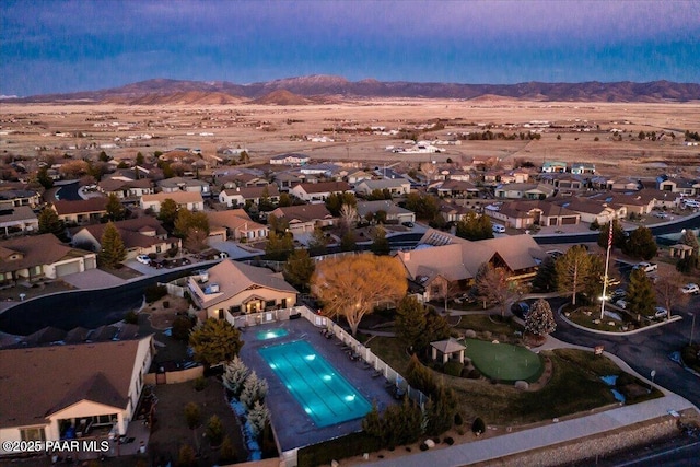 7708 N Siesta Sunset Ln, Prescott Valley, AZ 86315 - aerial perspective of suburban area with a mountainous background and a pool area