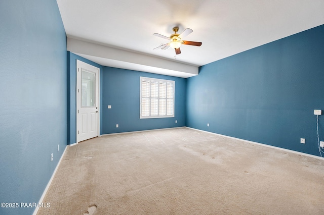 7708 N Siesta Sunset Ln, Prescott Valley, AZ 86315 - spare room with a ceiling fan, carpet flooring, and baseboards