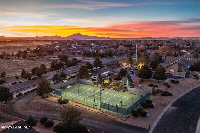 7708 N Siesta Sunset Ln, Prescott Valley, AZ 86315 - aerial view at dusk of a mountain view and a residential view