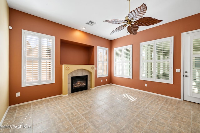 7708 N Siesta Sunset Ln, Prescott Valley, AZ 86315 - unfurnished living room with ceiling fan, a fireplace, tile patterned flooring, baseboards, and recessed lighting