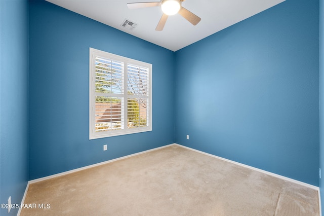7708 N Siesta Sunset Ln, Prescott Valley, AZ 86315 - empty room featuring carpet floors, a ceiling fan, and baseboards