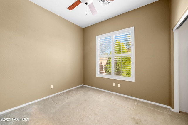 7708 N Siesta Sunset Ln, Prescott Valley, AZ 86315 - unfurnished room featuring a ceiling fan, light carpet, and baseboards
