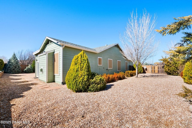 7708 N Siesta Sunset Ln, Prescott Valley, AZ 86315 - view of side of property with fence and an outdoor structure