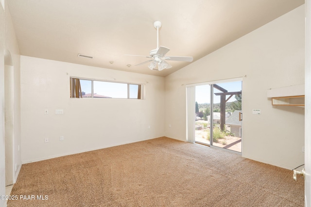 1269 N Oxbow Dr, Dewey-Humboldt, AZ 86327 - carpeted empty room with plenty of natural light, a ceiling fan, and vaulted ceiling