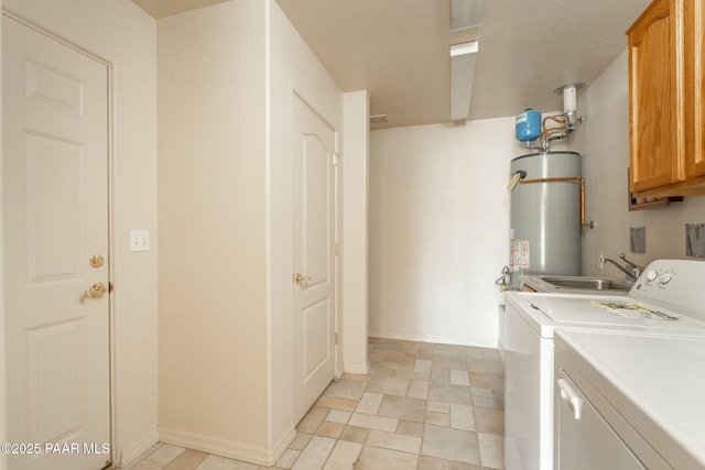 1269 N Oxbow Dr, Dewey-Humboldt, AZ 86327 - laundry room with water heater, cabinet space, and washing machine and dryer
