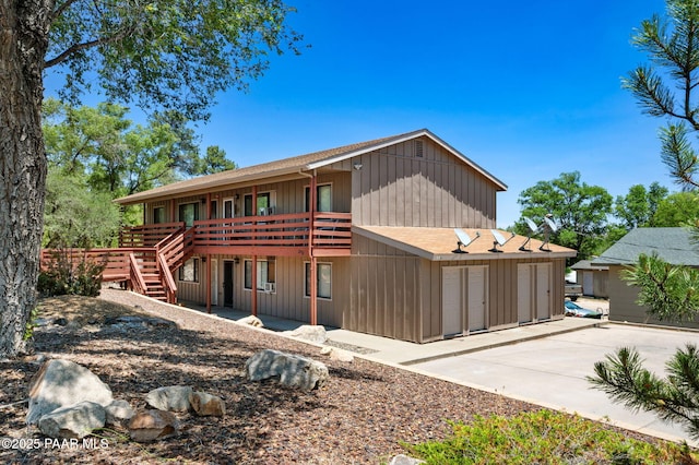 290 Madison Ave, Prescott, AZ 86301 - back of property featuring a wooden deck, stairs, and board and batten siding