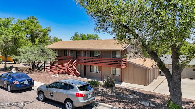 290 Madison Ave, Prescott, AZ 86301 - chalet / cabin with stairway, a shingled roof, and board and batten siding