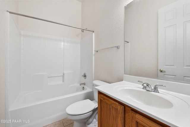 bathroom with toilet, tile patterned flooring, bathing tub / shower combination, and vanity