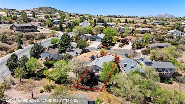bird's eye view with a residential view and a mountain view