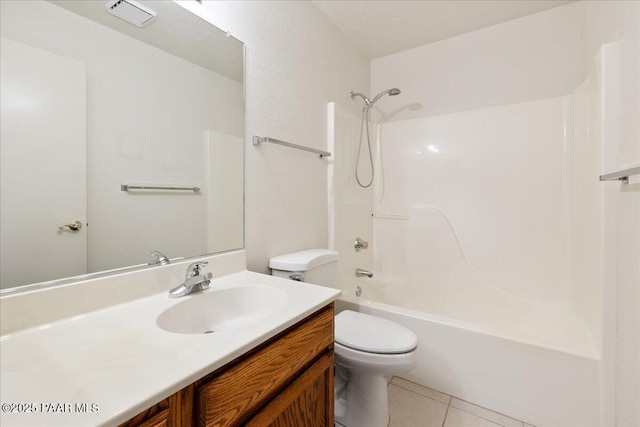 full bathroom with tile patterned floors, shower / bathing tub combination, toilet, and vanity