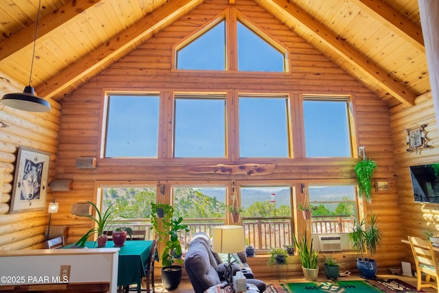 living room with cooling unit, wood ceiling, high vaulted ceiling, and beamed ceiling