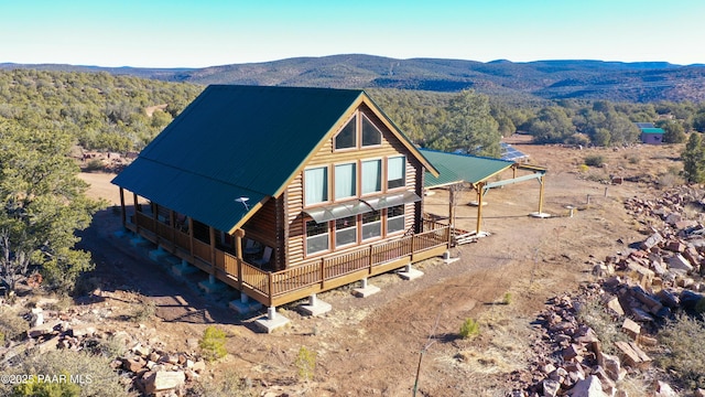 exterior space featuring a mountain view